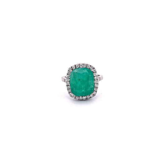 Anillo de esmeralda redonda con diamantes